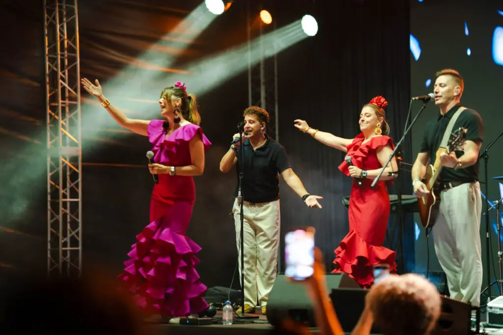 A group of performers on stage at Alma Casa de Campo