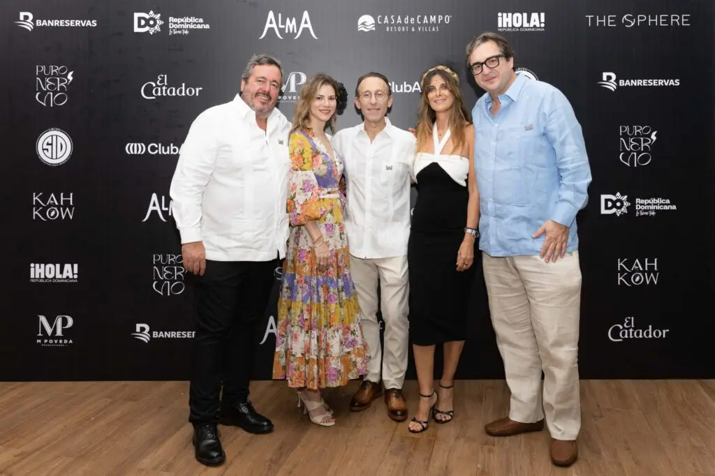 Guests pose for a photo at the Alma Casa de Campo event
