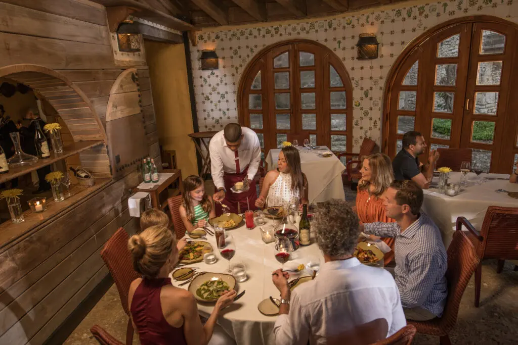 A family enjoying a meal at La Piazzetta