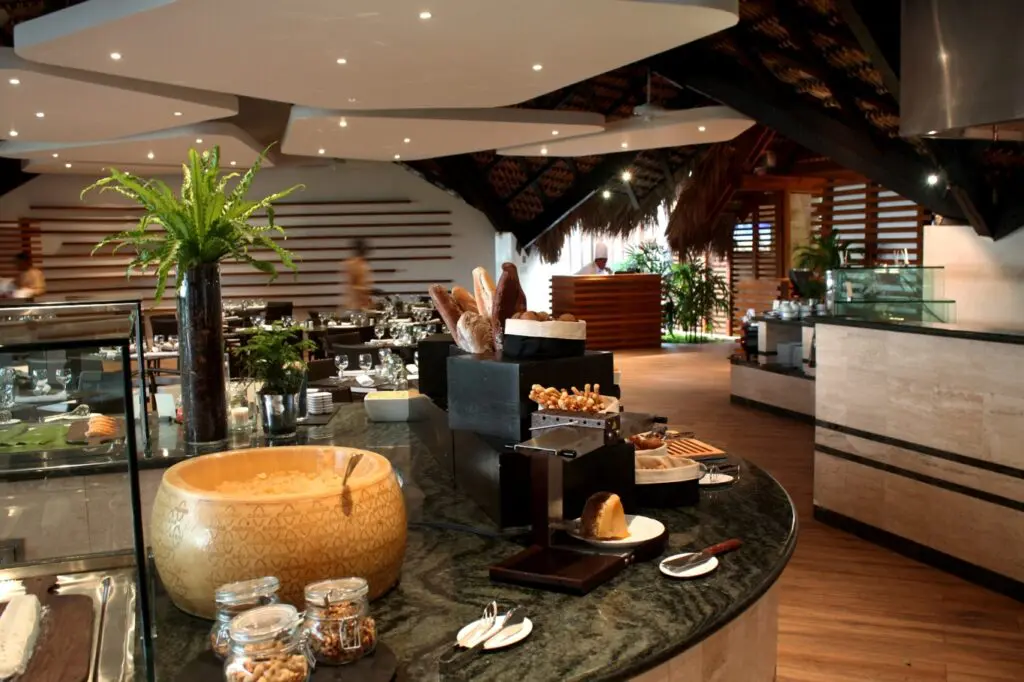 Bar area with small snacks and bread at Lago Restaurant