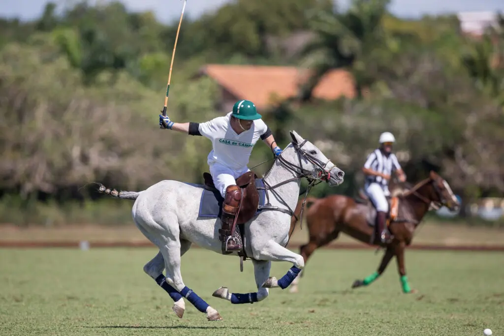 A game of polo taking place at our La Romana resort