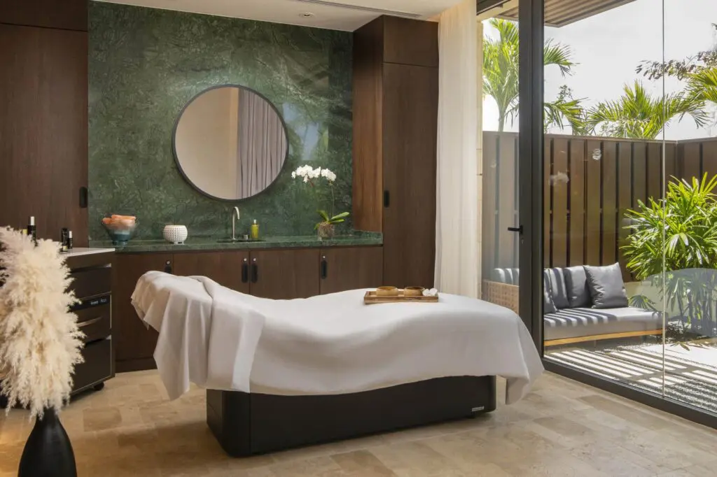 A relaxing spa room with an outdoor zen patio at Casa de Campo Resort and Villas