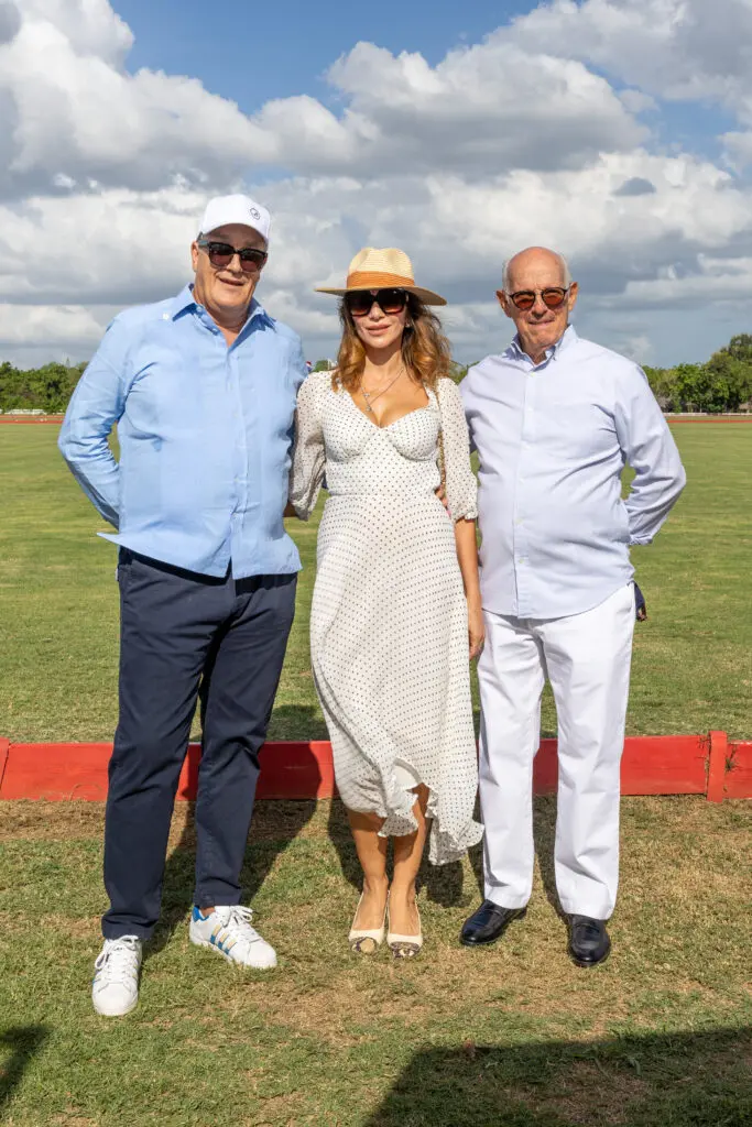 Michael Suitet, Elmira Suitet, and Alejandro Vicini pose at a Casa de Campo polo event
