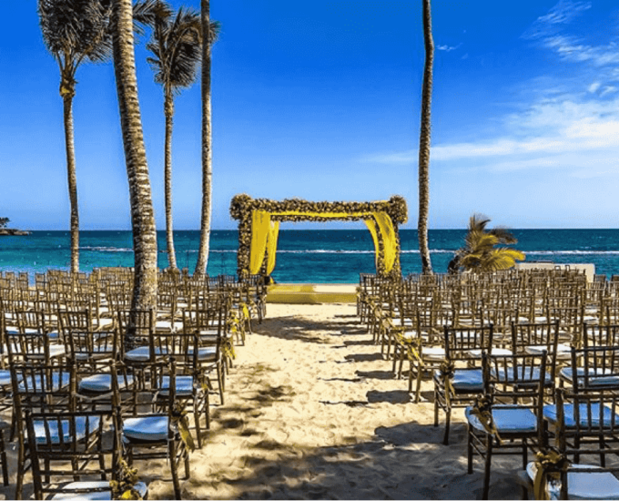Minitas Beach is showcased with tropical wedding decor. 