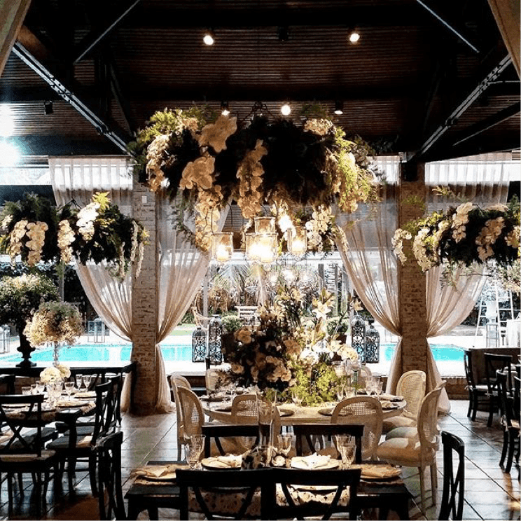 A lavish poolside wedding reception at Casa de Campo Resort & Villas. 