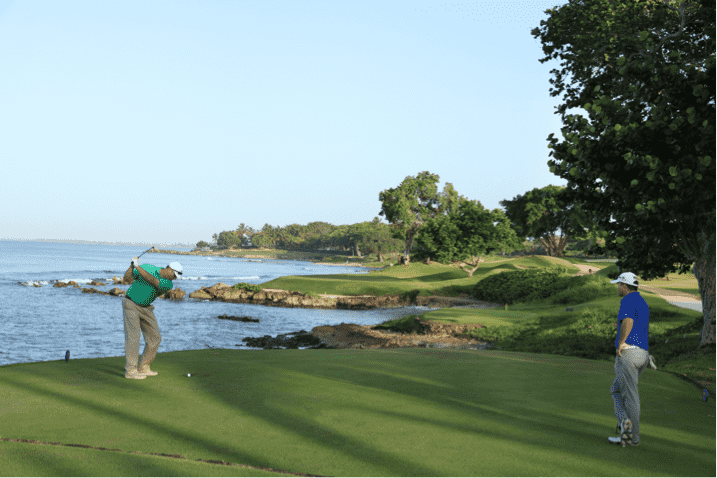 A golfer tees off at Teeth of the Dog®  in the Dominican Republic. 