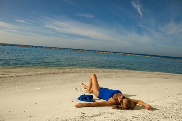 Enjoy the white-sand beach at Minitas