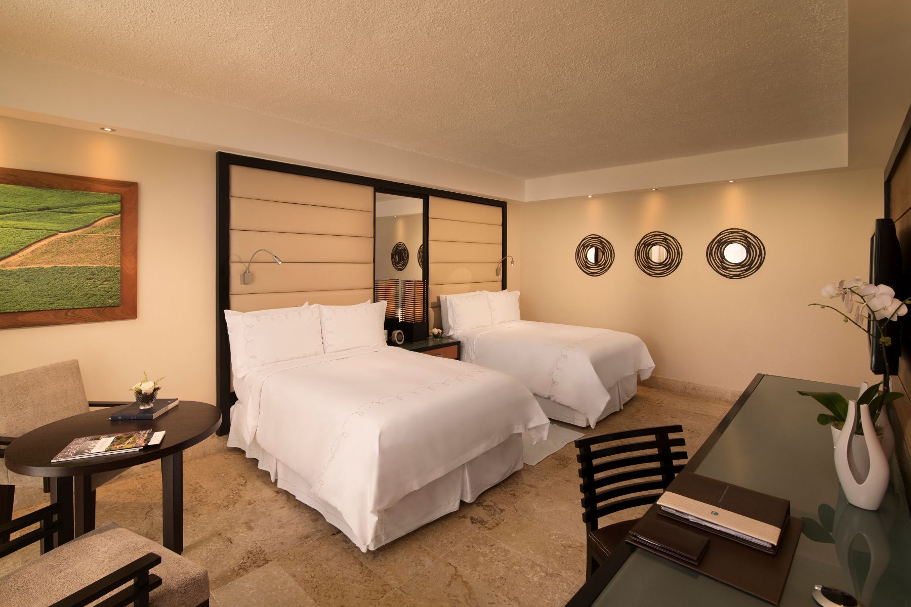 Elite Dominican Republic Resort Hotel Suite With Double Beds and Patio at Casa de Campo Resort & Villas.