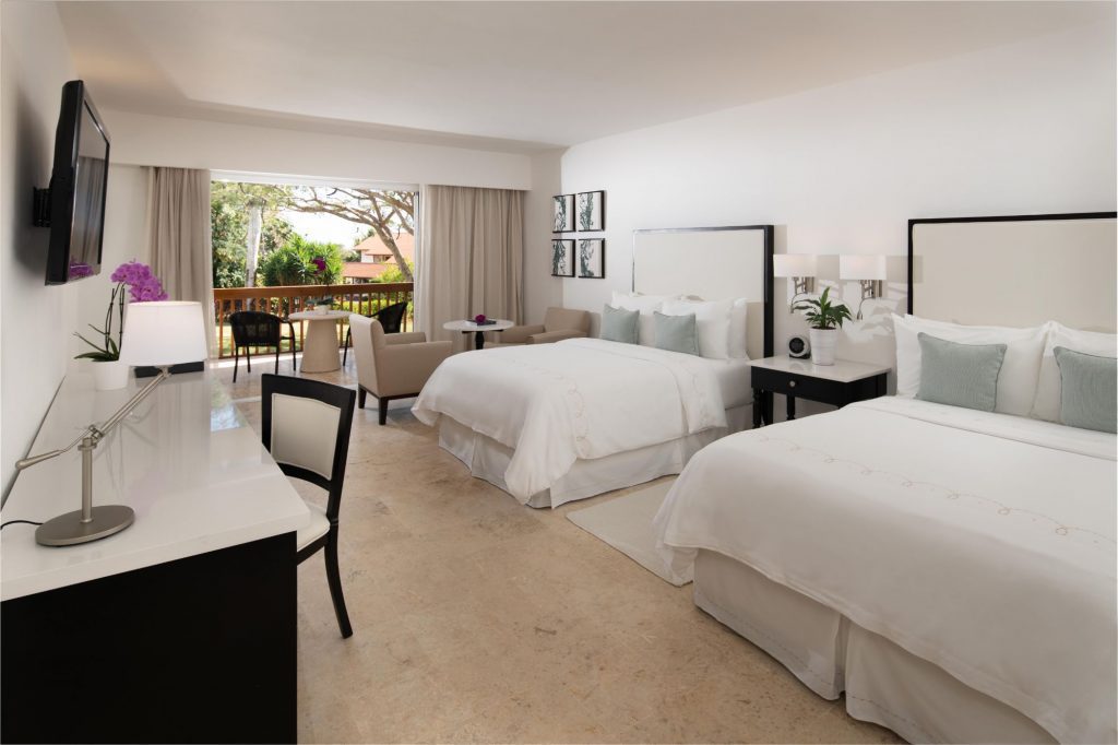Deluxe Resort Hotel Room Double Beds With Patio at Casa de Campo Resort & Villas in the Dominican Republic.