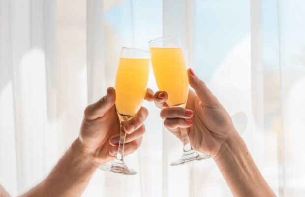 Mimosas cheers Cheering with mimosas