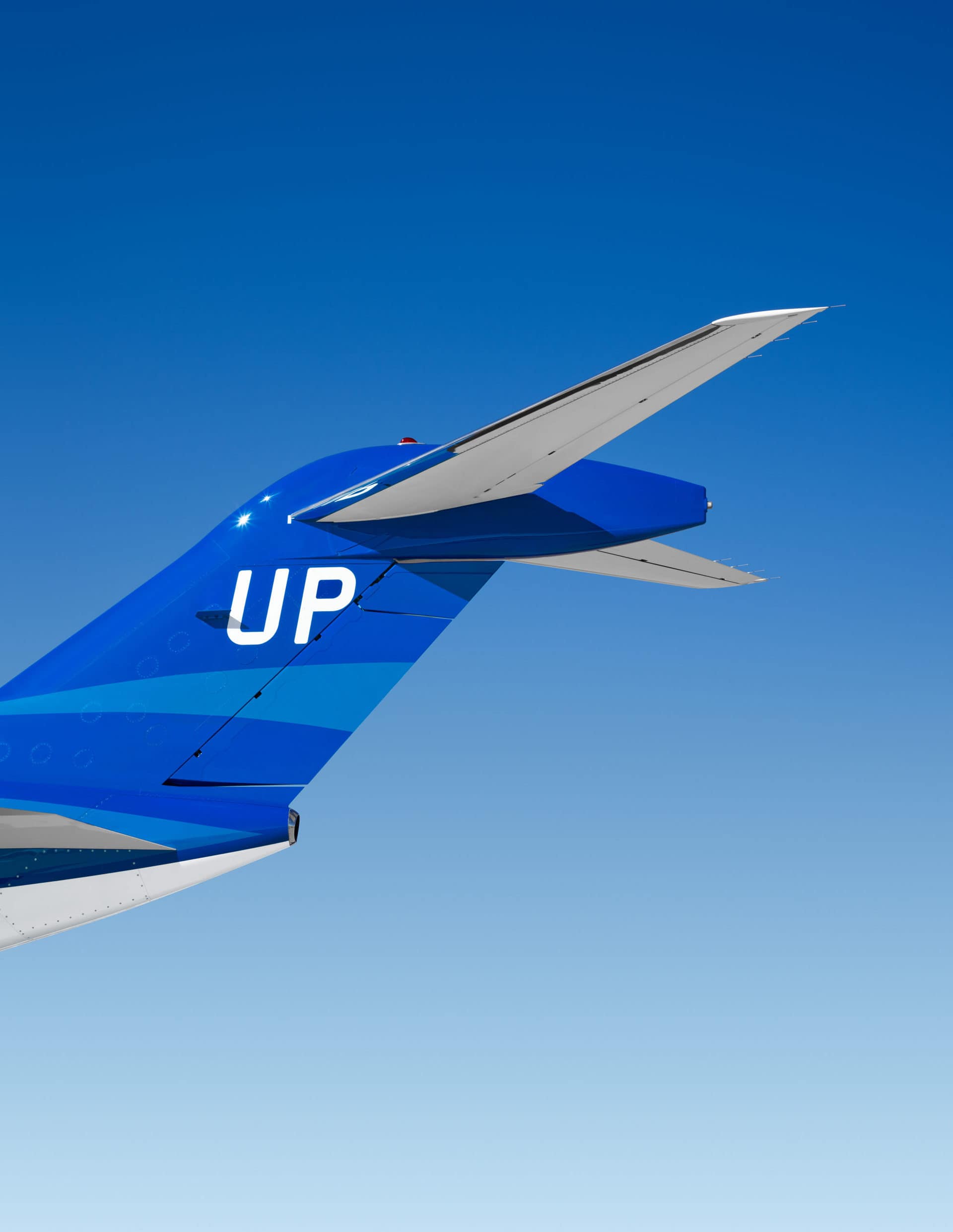 Wheels Up jet with UP logo