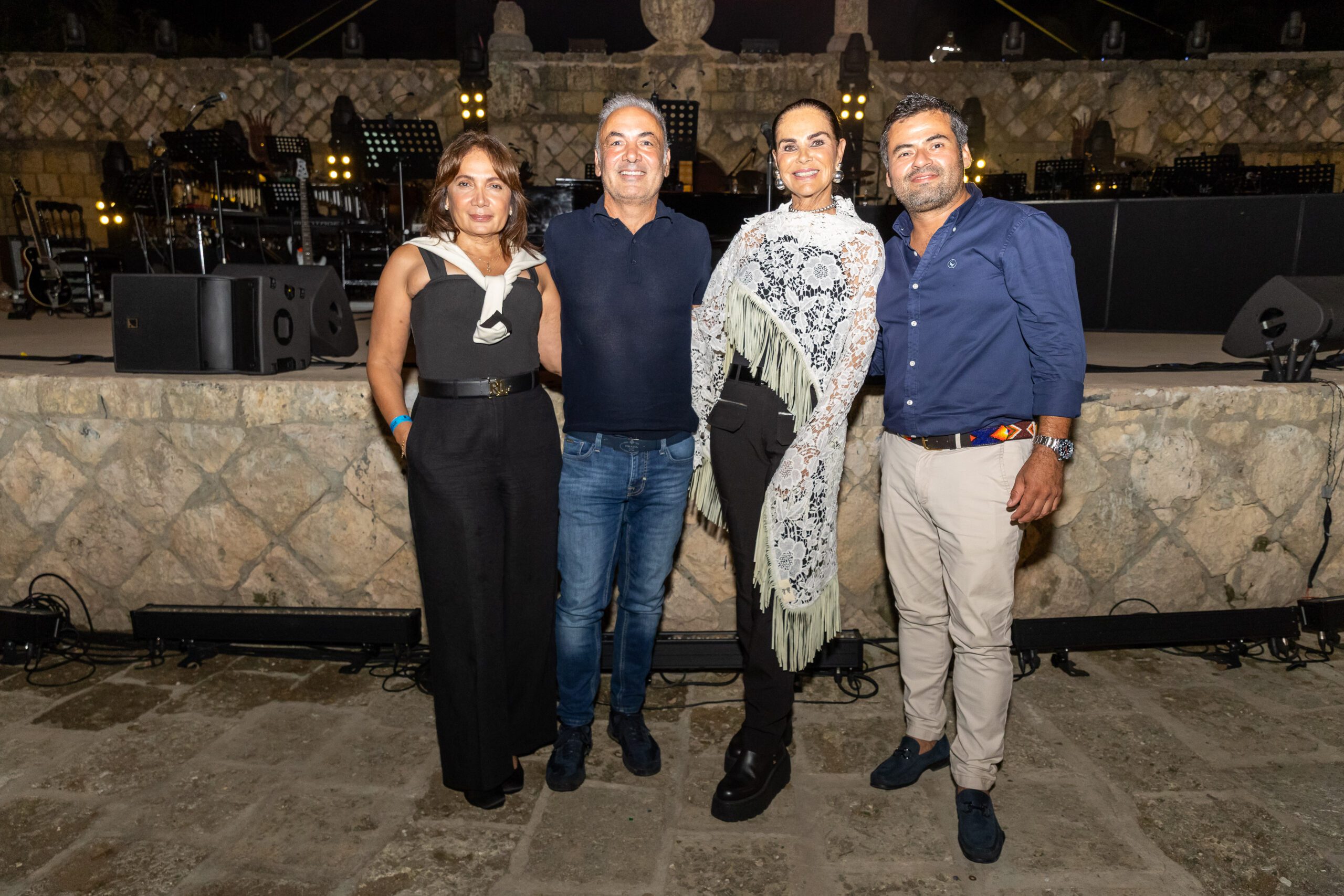 Guests posing together at the 50th anniversary concert at our Caribbean event venue