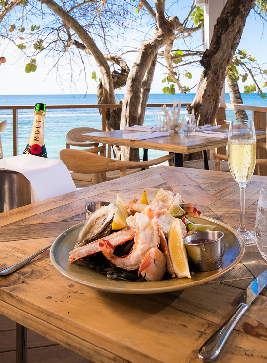 Elegant seafood dinner at Minitas Beach Club & Restaurant