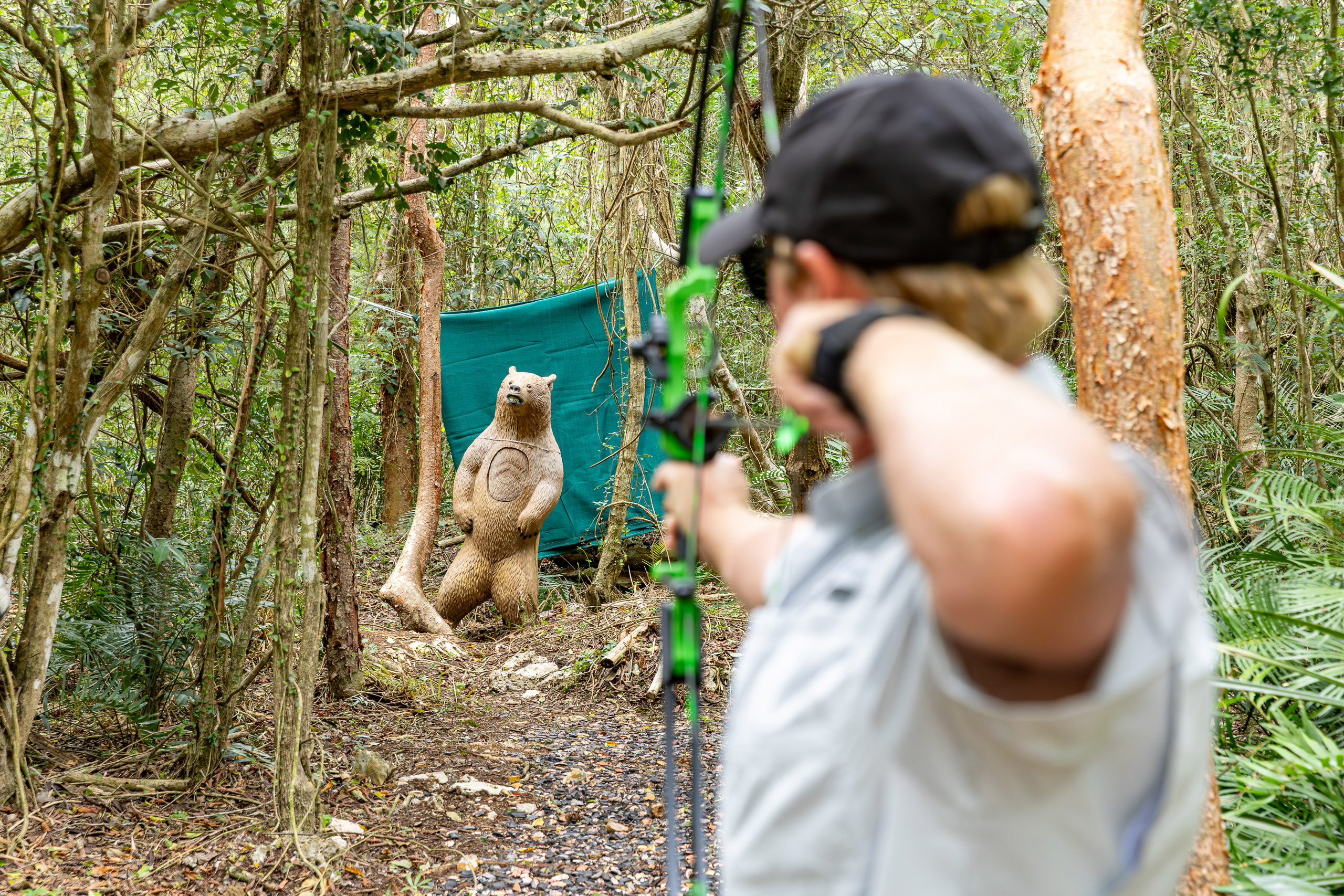 Bow and Arrow station with life-sized bear target