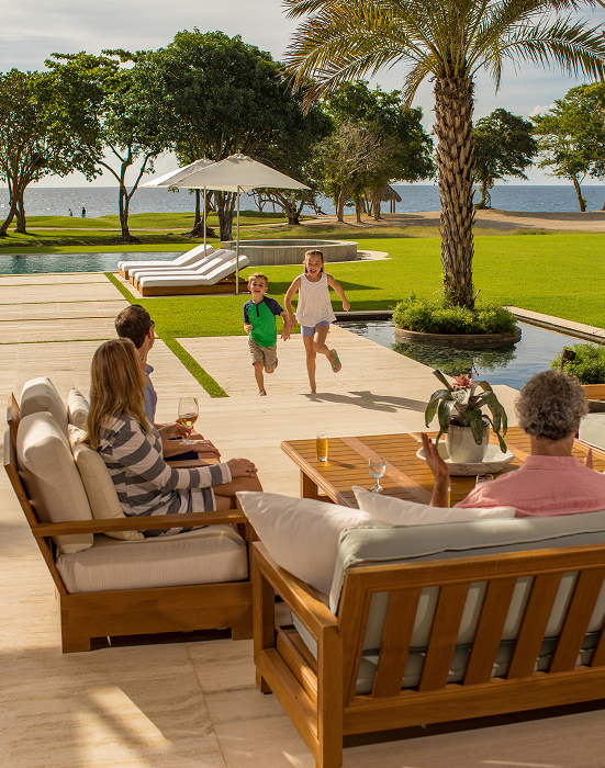 Family enjoying an oceanfront villa at Casa de Campo