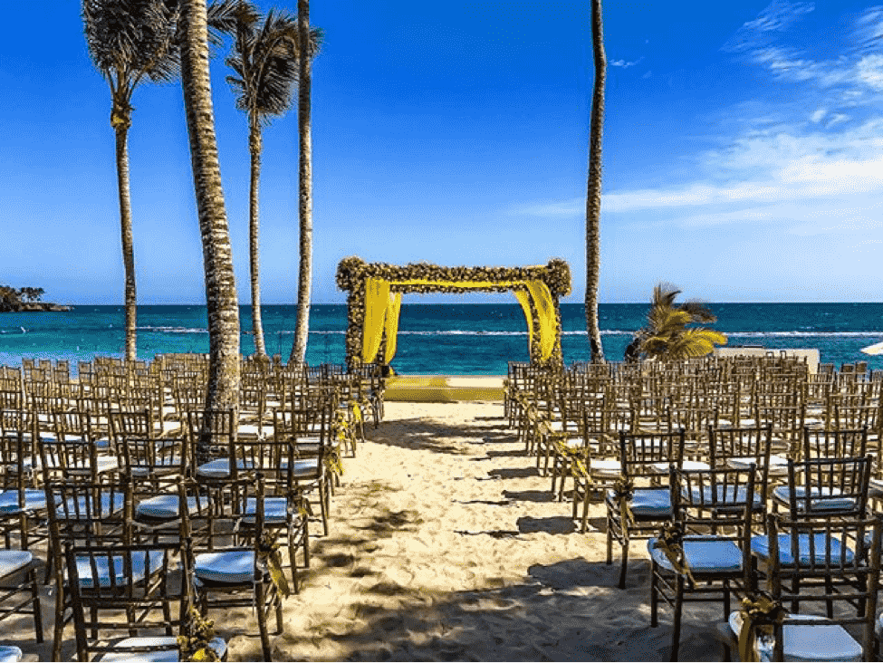 Minitas Beach is showcased with tropical wedding decor.
