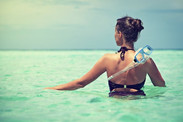 Snorkeling in the clear Caribbean waters of the Dominican Republic at Casa de Campo Resort & Villas 