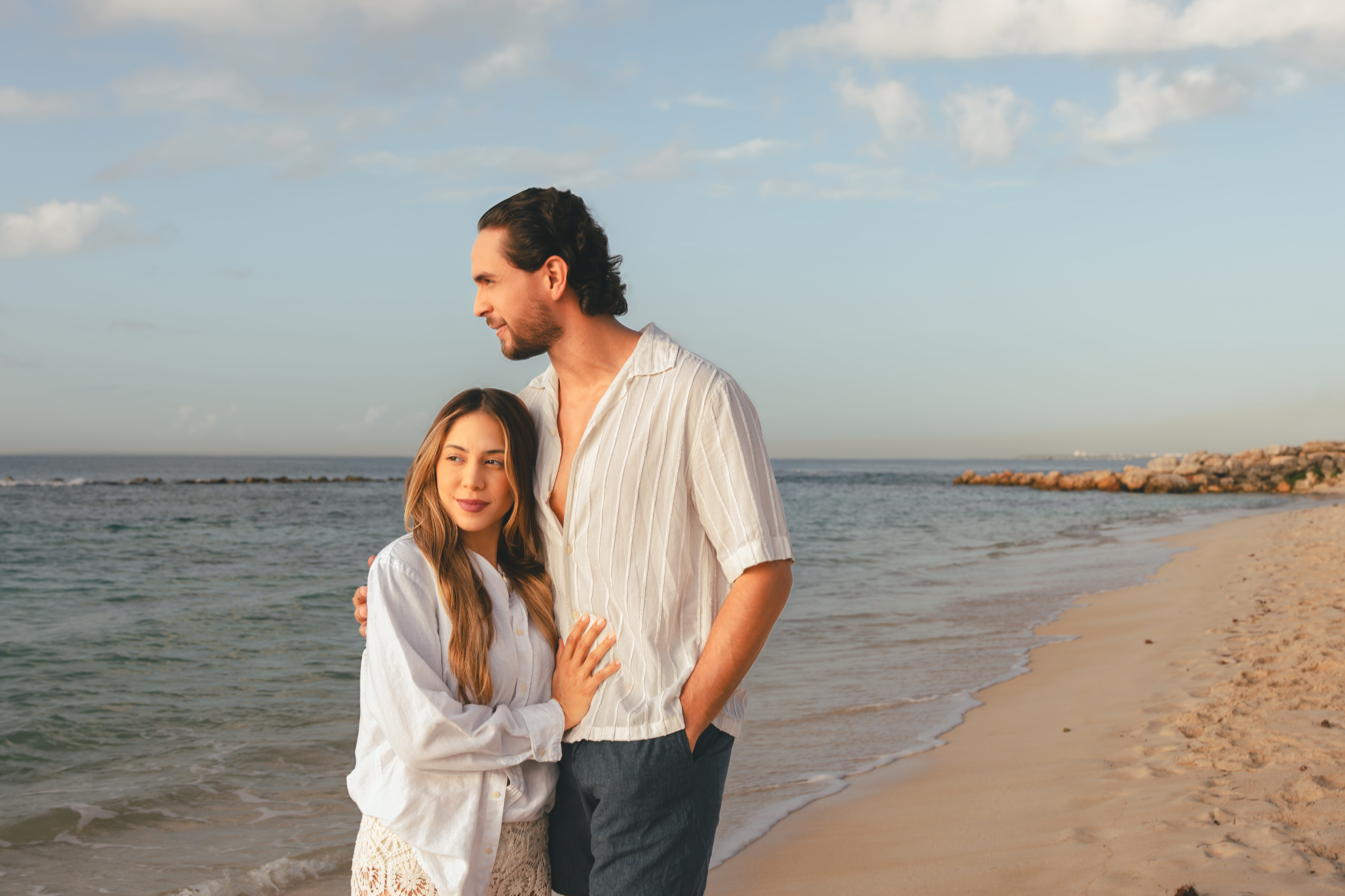 Romantic couple at Minitas Beach embracing