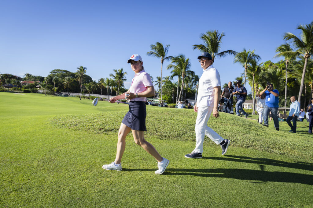 Lorena Ochoa walking a Dominican Republic golf course